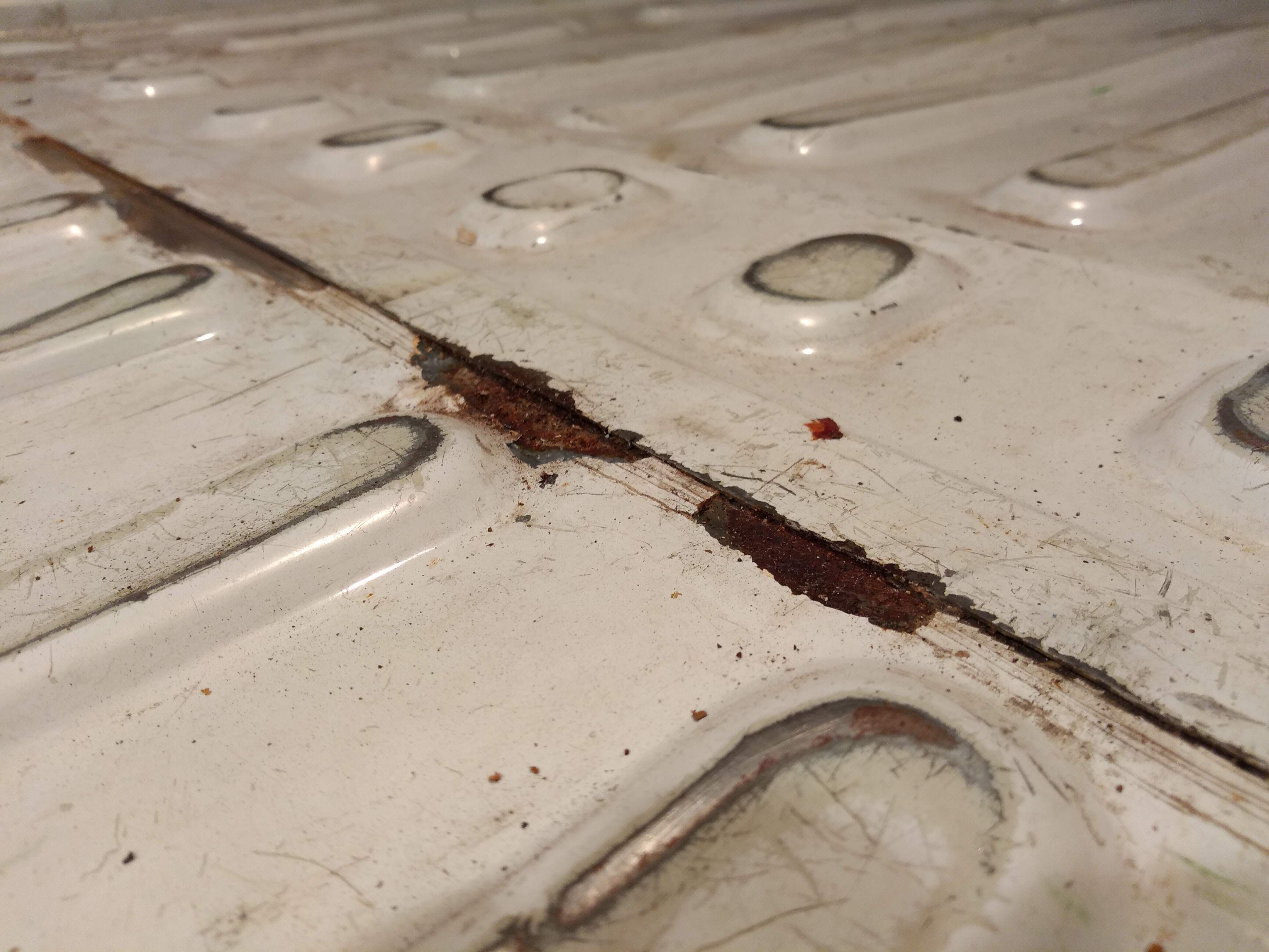 The rusty original condition.